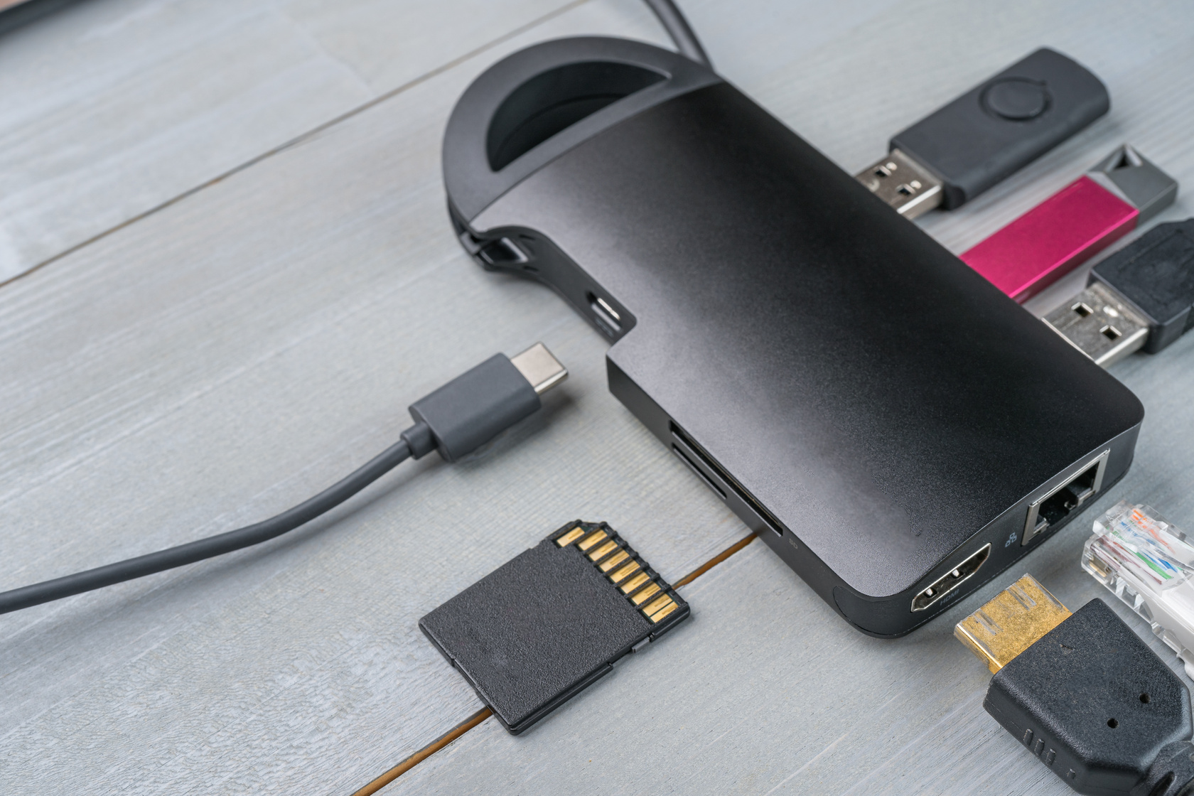 USB Type C adapter or hub with various accessories.