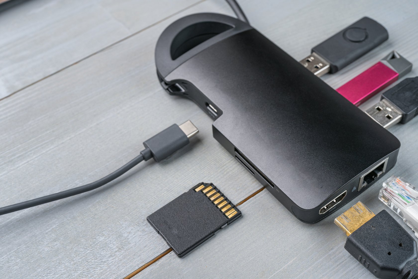USB Type C adapter or hub with various accessories.
